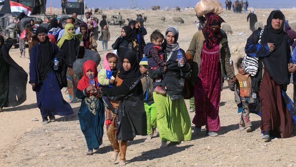 Civili in fuga da Mosul - Sputnik Afrique