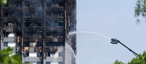 Police londonienne: 58 morts dans l’incendie de la tour Grenfell - Sputnik Afrique