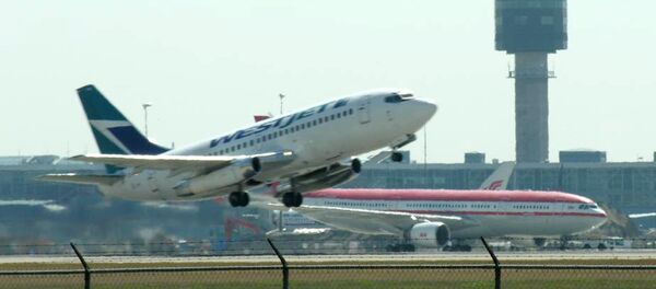 An airplane taking off from Vancouver International Airport - Sputnik Afrique