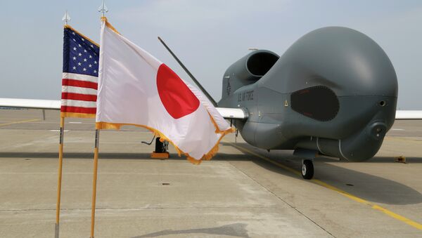 An advanced Global Hawk surveillance drone is displayed outside its hangar at Misawa Air Base in northern Japan Friday, May 30, 2014. - Sputnik Afrique