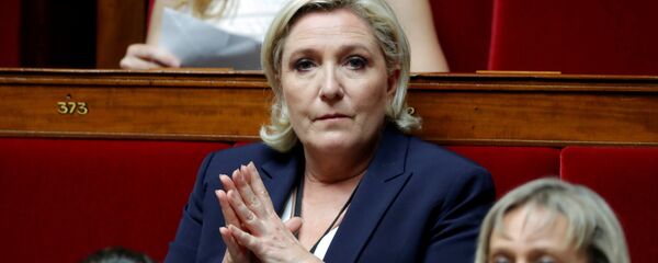 Newly-elected member of parliament Marine Le Pen of France's far-right National Front (FN) political party attends the opening session of the French National Assembly in Paris, France, June 27, 2017. Newly-elected member of parliament Marine Le Pen of France's far-right National Front (FN) political party attends the opening session of the French National Assembly in Paris, France, June 27, 2017. - Sputnik Afrique