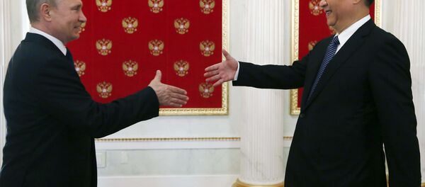 Le président russe Vladimir Poutine et son homologue chinoise Xi Jinping - Sputnik Afrique