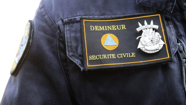 This photo taken on June 9, 2016 in Marly-le-Roi shows the patch of the member of the National Demining Unit of the Ministry of Interior. - Sputnik Afrique
