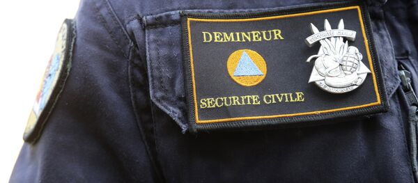 This photo taken on June 9, 2016 in Marly-le-Roi shows the patch of the member of the National Demining Unit of the Ministry of Interior. - Sputnik Afrique