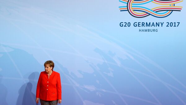 Angela Merkel wartet auf die G20-Gäste in Hamburg - Sputnik Afrique