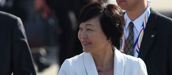 Japan´s Prime Minister's wife Akie Abe arrives with her husband at the airport in Hamburg, northern Germany on July 6, 2017 to attend the G20 meeting. - Sputnik Afrique