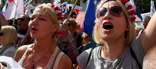 Protesty przeciwko reformie sądownictwa w Warszawie - Sputnik Afrique