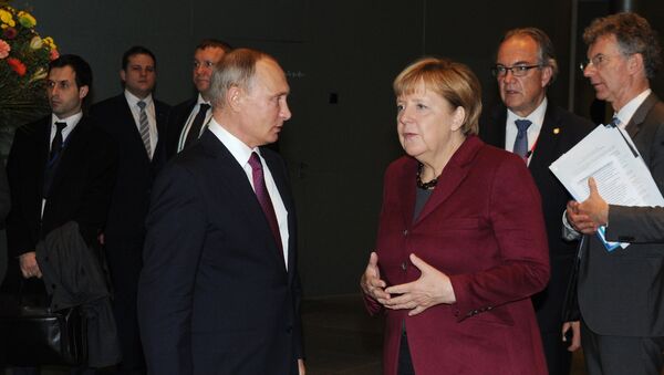 Wladimir Putin und Angela Merkel (Archivbild) - Sputnik Afrique