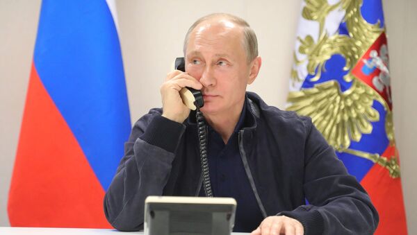 Vladimir Poutine lors d'un entretien téléphonique - Sputnik Afrique