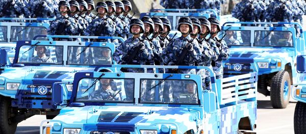 Soldiers of China's People's Liberation Army (PLA) take part in a military parade to commemorate the 90th anniversary of the foundation of the army at the Zhurihe military training base in Inner Mongolia Autonomous Region, China, July 30, 2017. - Sputnik Afrique