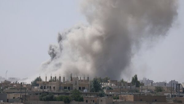 Smoke rises from the Raqqa province Syria. (File) - Sputnik Afrique