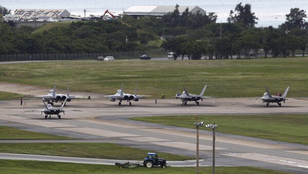 U.S. Air Force F-22 Raptors, right, and two F-15 Eagles prepare for take-off at Kadena Air Base on the southern island of Okinawa, in Japan (File) - Sputnik Afrique