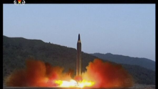 Le tir d'un missile Hwasong-12 en Corée du Nord - Sputnik Afrique