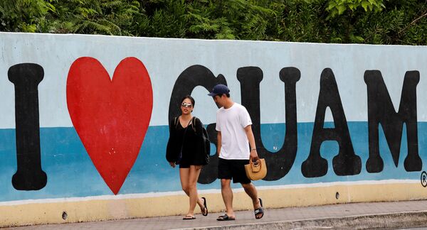 Des touristes sur une plage sur l’île américaine de Guam - Sputnik Afrique