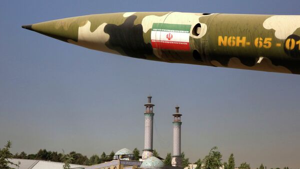 A missile is displayed at an exhibition on the 1980-88 Iran-Iraq war, at a park, northern Tehran, Iran, Thursday, Sept. 25, 2014 - Sputnik Afrique