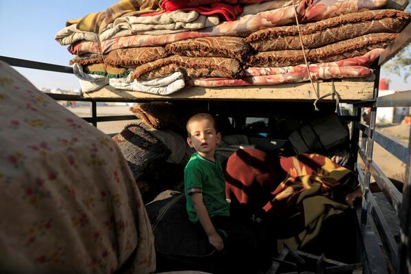 Un garçon dans un camp de déplacés au nord de Raqqa, en Syrie - Sputnik Afrique