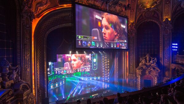 Screens display Ludwig Wåhlberg, player for EG team, during a semifinal match against OG team at the Boston Major Dota 2 tournament at the Wang Theatre in Boston. (File) - Sputnik Afrique