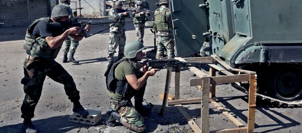 Lebanese army soldiers open fire during clashes with Islamic militants in the northern port city of Tripoli, Lebanon. - Sputnik Afrique