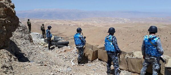 Fighters from the Syrian army units and Hezbollah are seen on the western mountains of Qalamoun, near Damascus, in this handout picture provided by SANA on July 23, 2017, Syria - Sputnik Afrique