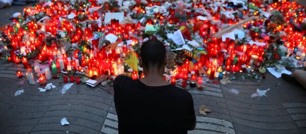 Bougies en hommage aux victimes de l'attentat de Barcelone - Sputnik Afrique
