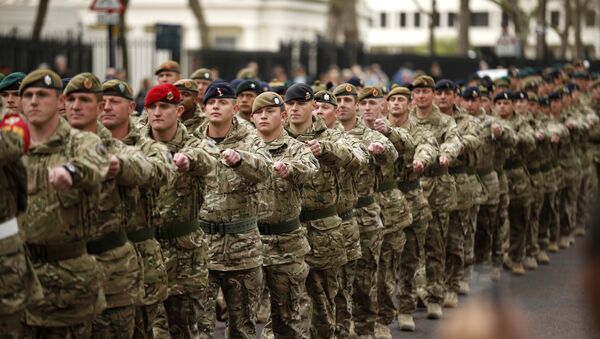Members of the British military's 4th Mechanised Brigade parade through central London to attend a reception at the Houses of Parliament, Monday, April 22, 2013. The soldiers recently returned from six months serving in Afghanistan's Helmand province. - Sputnik Afrique