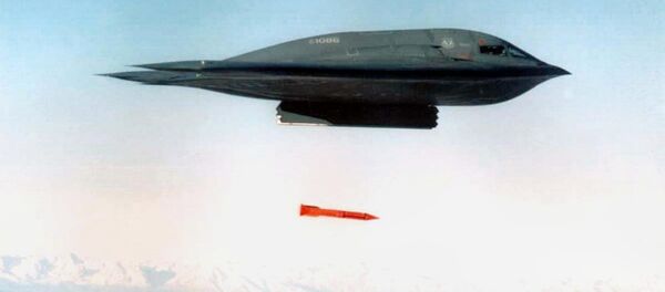 An undated file picture shows a B-2 Spirit Bomber droping a B61-11 bomb casing from an undisclosed location - Sputnik Afrique