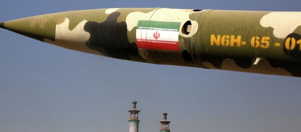 A missile is displayed at an exhibition on the 1980-88 Iran-Iraq war, at a park, northern Tehran, Iran, Thursday, Sept. 25, 2014 - Sputnik Afrique