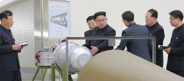 North Korean leader Kim Jong Un provides guidance on a nuclear weapons program in this undated photo released by North Korea's Korean Central News Agency (KCNA) in Pyongyang September 3, 2017 - Sputnik Afrique