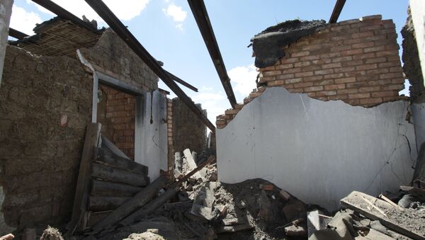Последствия обстрела в поселке Александровка Донецкой области - Sputnik Afrique