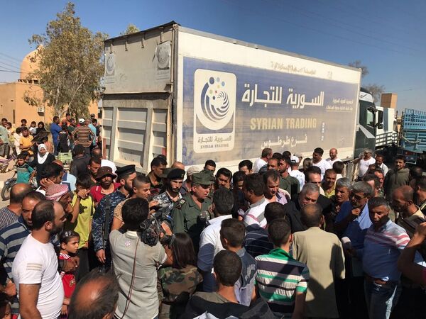 Un convoi chargé de vivres et de médicaments est arrivé à Deir ez-Zor - Sputnik Afrique