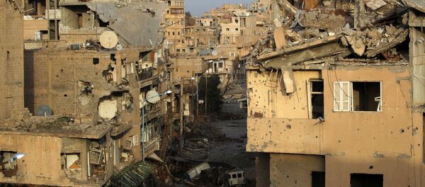 A view shows damaged buildings in Deir al-Zor, eastern Syria February 19, 2014 - Sputnik Afrique