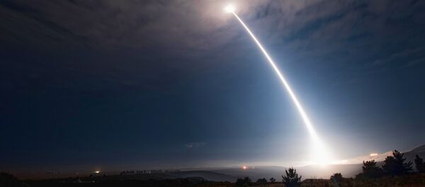 In this image taken with a slow shutter speed and provided by Vandenberg Air Force Base, an unarmed Minuteman 3 missile launches from Vandenberg Air Force Base, Calif., Wednesday, Aug. 2, 2107. - Sputnik Afrique