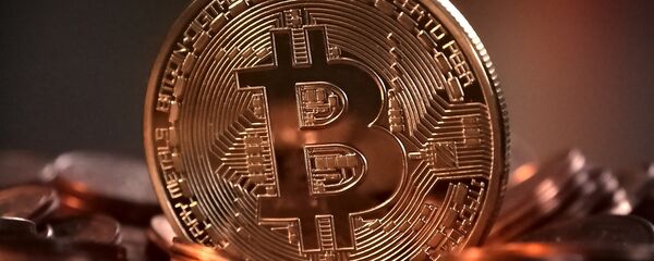 Un bitcoin - Sputnik Afrique