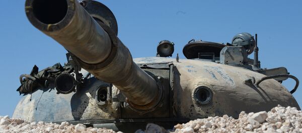 Un T-55 en positon en Syrie - Sputnik Afrique