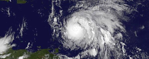 This Sunday, Sept. 17, 2017, GOES East satellite image provided by NASA taken at 7:45 p.m EDT, shows Hurricane Maria as it approaches the Lesser Antilles. - Sputnik Afrique