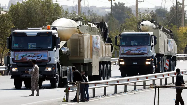 The new Iranian long range missile Khoramshahr (front) is displayed during the annual military parade marking the anniversary of the outbreak of its devastating 1980-1988 war with Saddam Hussein's Iraq, on September 22,2017 in Tehran - Sputnik Afrique