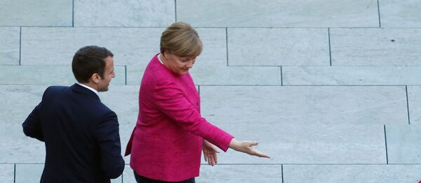 Das erste bilaterale Treffen von Emmanuel Macron und Angela Merkel in Berlin  - Sputnik Afrique