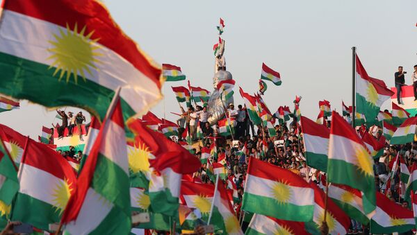 Kurds celebrate to show their support for the upcoming September 25th independence referendum in Erbil - Sputnik Afrique