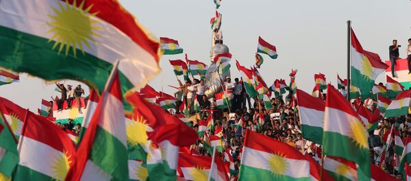 Kurds celebrate to show their support for the upcoming September 25th independence referendum in Erbil - Sputnik Afrique