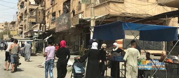 Des civils à Deir ez-Zor - Sputnik Afrique