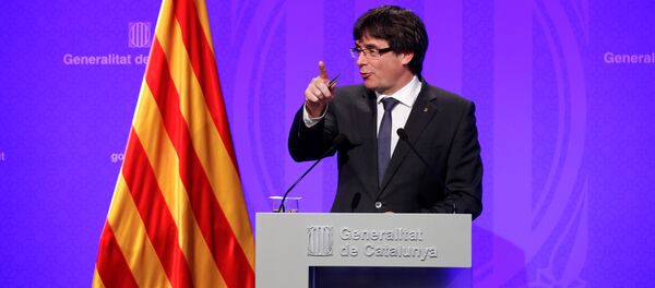 Catalan President Carles Puigdemont speaks during a news conference at Generalitat Palace in Barcelona - Sputnik Afrique
