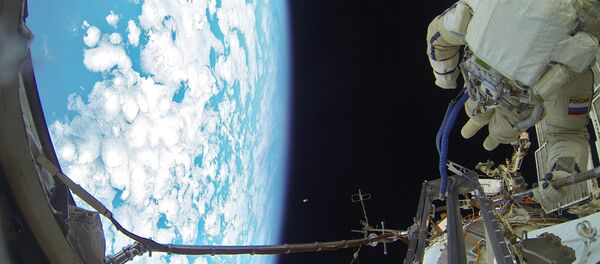 Les cosmonautes russes effectuent une sortie dans l'espace - Sputnik Afrique