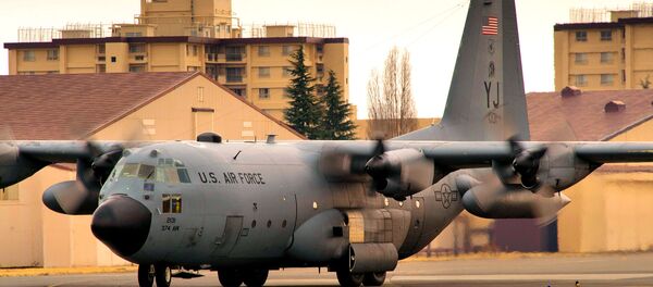 Un Hercules C-130H en la base estadounidense de Yokota Un Hercules C-130H en la base estadounidense de Yokota - Sputnik Afrique