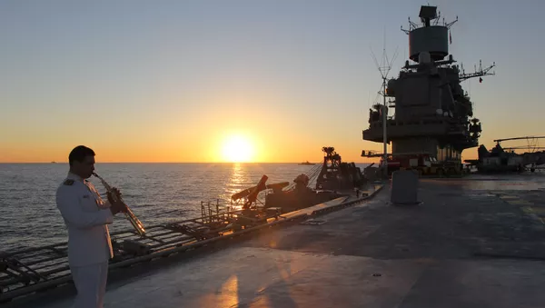 The aircraft carrier Admiral Kuznetsov sails together with the Russian Northern Fleet's carrier battle group through the English Channel. This hand-out was provided by a third party for editorial use only. Archive storage, commercial use and advertising campaigns are banned. - Sputnik Afrique