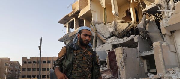 Voják SDF v Rakce - Sputnik Afrique