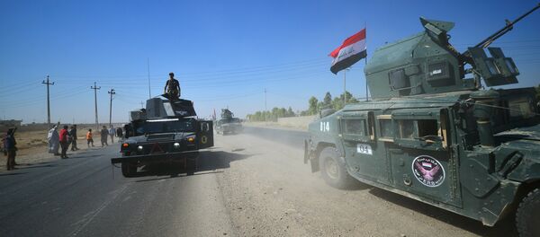 Members of Iraqi federal forces gather to continue to advance in military vehicles in Kirkuk, Iraq - Sputnik Afrique