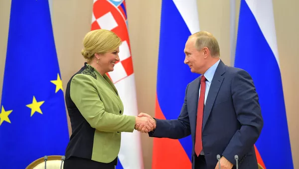 Президент РФ В. Путин встретился с президентом Хорватии К. Грабар-Китарович - Sputnik Afrique