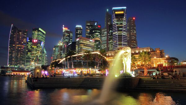 Символ города - Мерлион (лев с хвостом русалки) на набережной Эспланада в Сингапуре. - Sputnik Afrique