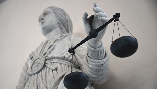 A picture taken on May 19, 2015 at Rennes' courthouse shows a statue of the goddess of Justice balancing the scales. - Sputnik Afrique