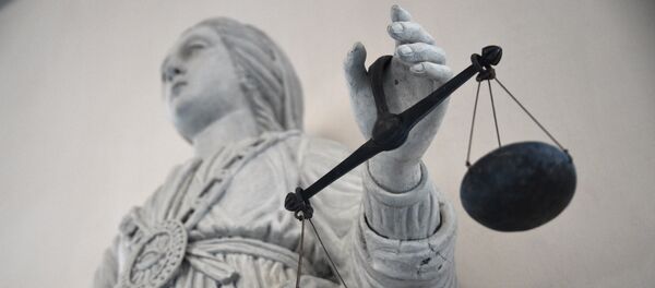 A picture taken on May 19, 2015 at Rennes' courthouse shows a statue of the goddess of Justice balancing the scales. - Sputnik Afrique
